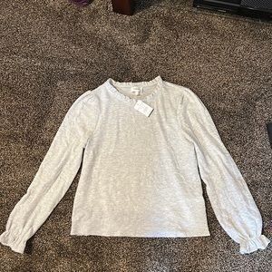 Long sleeved ruffle top